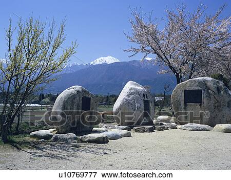 Stock Photo - Mt. Jonen and monuments, Nagano Prefecture, Japan. Fotosearch