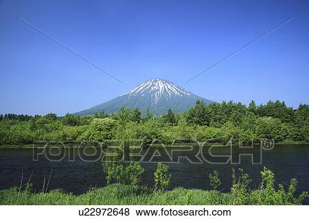Stock Photo - Mt. Youtei and river, Hokkaido Prefecture, Japan . Fotosearch