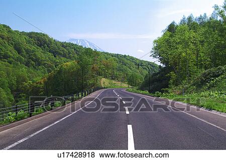 Mt. Youtei and road, Hokkaido Prefecture, Japan View Large Photo Image Stock Photo - Mt. Youtei and road, Hokkaido Prefecture, Japan. Fotosearch
