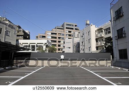 Parking Lot and Apartment Buildings View Large Photo Image Stock Photo - Parking Lot and Apartment Buildings. Fotosearch
