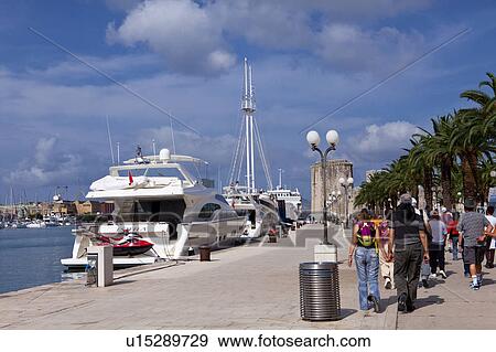 Pedestrians at Waterfront View Large Photo Image Stock Photo - Pedestrians at Waterfront. Fotosearch