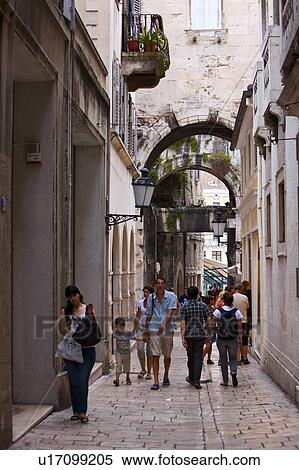 Pedestrians Walking Down Alley View Large Photo Image Stock Photography - Pedestrians Walking Down Alley. Fotosearch