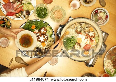 People eating Nabe, Tokyo Prefecture, Japan View Large Photo Image Picture - People eating Nabe, Tokyo Prefecture, Japan. Fotosearch