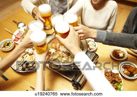 Stock Photography - People toasting, Tokyo Prefecture, Japan. Fotosearch