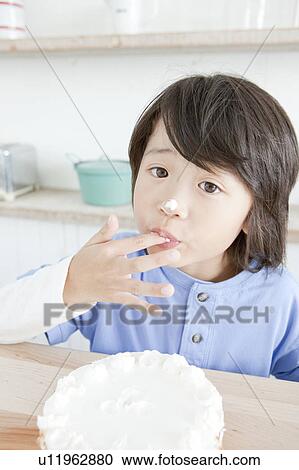 Portrait of a boy with an icing on his finger, Hyogo Prefecture, Honshu, Japan View Large Photo Image Stock Image - Portrait of a boy with an icing on his finger, Hyogo Prefecture, Honshu, Japan. Fotosearch