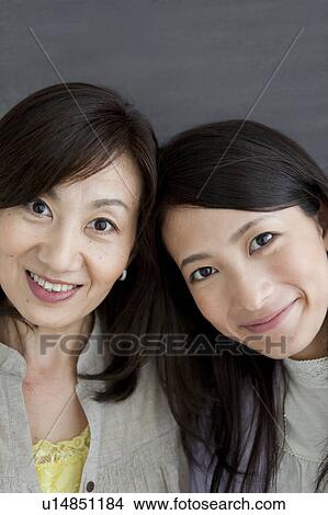 Portrait of mother and daughter View Large Photo Image Picture - Portrait of mother and daughter. Fotosearch