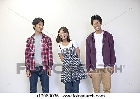 Portrait of three young people View Large Photo Image Stock Photograph - Portrait of three young people . Fotosearch
