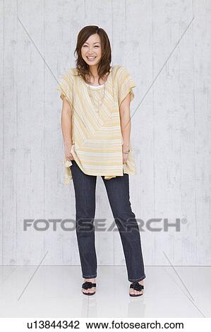 Stock Image - Portrait of young woman. Fotosearch