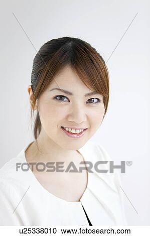Portrait of young woman View Large Photo Image Stock Image - Portrait of young woman. Fotosearch