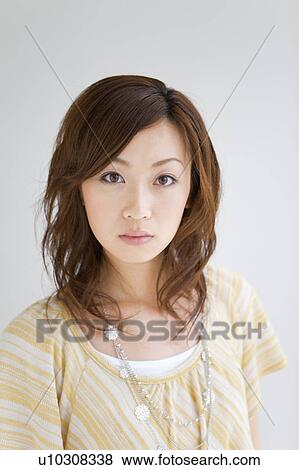 Portrait of young woman View Large Photo Image Stock Photo - Portrait of young woman. Fotosearch