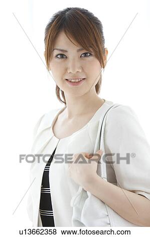 Portrait of young woman View Large Photo Image Stock Photo - Portrait of young woman. Fotosearch