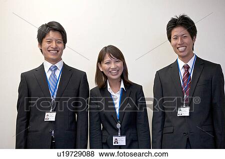 Stock Photo - Portrait shots of three business people. Fotosearch