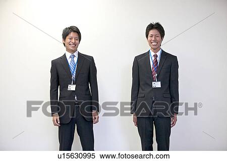 Stock Photography - Portrait shots of two business people. Fotosearch