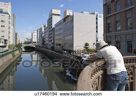 Picture - River getting cleaned by bacteria, Nagoya city, Aichi Prefecture, Japan. Fotosearch