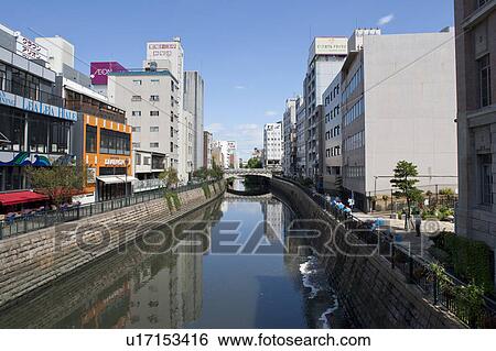 Stock Photograph - River getting cleaned by bacteria, Nagoya city, Aichi Prefecture, Japan. Fotosearch