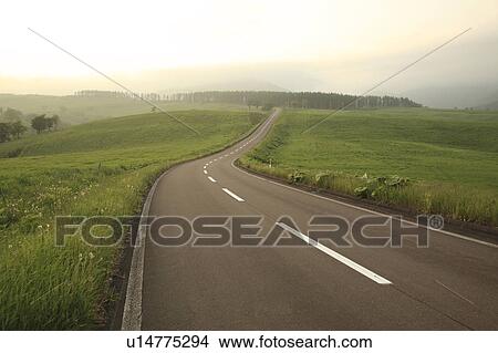 Picture - Road at dusk, Hokkaido Prefecture, Japan. Fotosearch