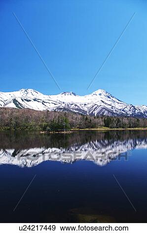 Stock Photo - Shiretoko mountain range and lake, Hokkaido Prefecture, Japan. Fotosearch
