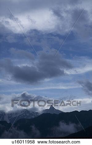 Stock Photo - Silhoutted Mountains. Fotosearch
