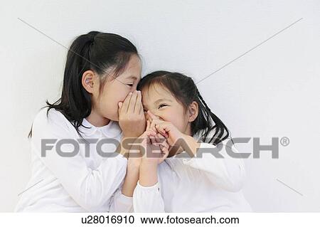 Sisters Whispering View Large Photo Image Stock Image - Sisters Whispering. Fotosearch