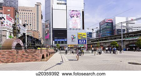 Stock Image - SL Square Outside Shinbashi Station. Fotosearch