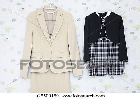 Stock Photo - Suits hanging. Fotosearch