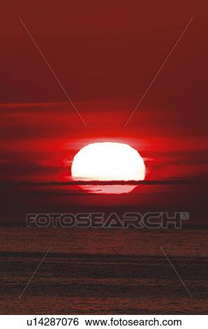 Stock Photograph - Sunrise at Sea of Okhotsk, Hokkaido Prefecture, Japan. Fotosearch