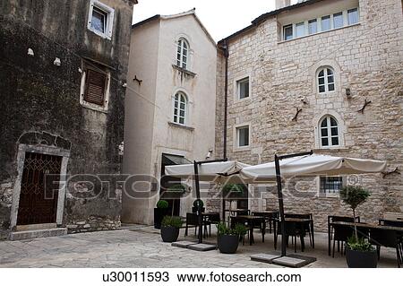 Tables and Chairs in Small Town Square View Large Photo Image Stock Image - Tables and Chairs in Small Town Square. Fotosearch