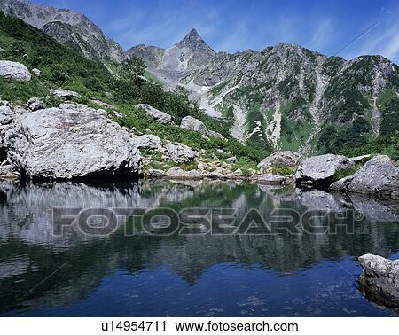 Stock Image - Tengu pond and Mt. Yarigatake, Nagano Prefecture, Japan. Fotosearch