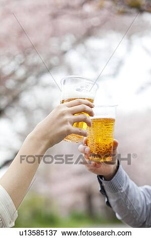 Toasting with beers View Large Photo Image Stock Photo - Toasting with beers. Fotosearch