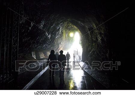 Stock Photo - Tourists at Postojna Limestone Cave. Fotosearch