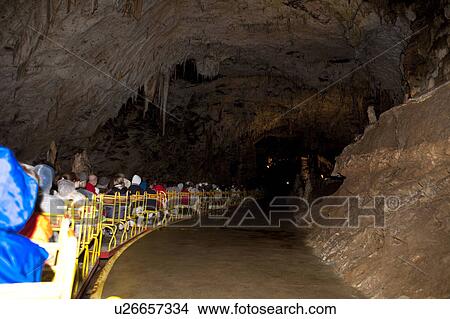 Tourists in Train in Postojna Cave View Large Photo Image Picture - Tourists in Train in Postojna Cave. Fotosearch