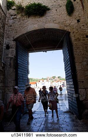 Tourists Walking Through Gate View Large Photo Image Stock Image - Tourists Walking Through Gate. Fotosearch