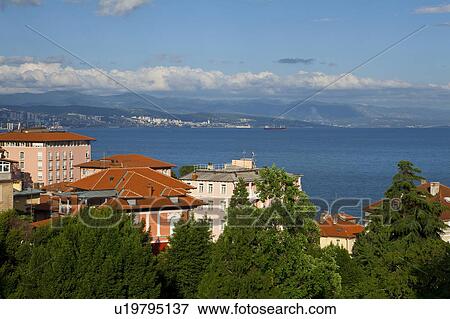Stock Photo - View of Houses and Sea. Fotosearch