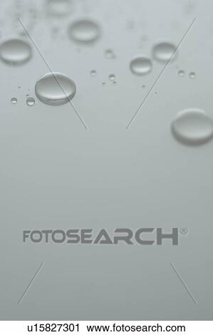 Stock Image - Water drop on white background. Fotosearch