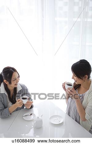 Women drinking coffee View Large Photo Image Stock Photo - Women drinking coffee. Fotosearch