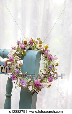 Stock Image - Wreath on Chair. Fotosearch