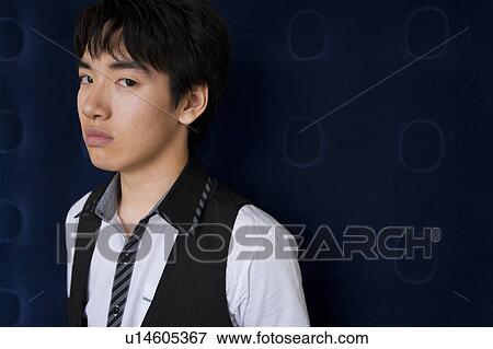 Youngman looking at camera View Large Photo Image Stock Photo - Youngman looking at camera. Fotosearch