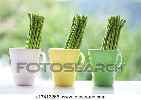 Stock Photograph - Asparagus in cups. Fotosearch