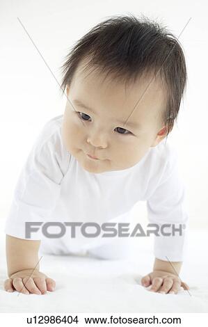 Picture - Baby Boy Crawling. Fotosearch