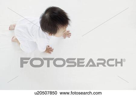 Stock Image - Baby Boy Crawling. Fotosearch
