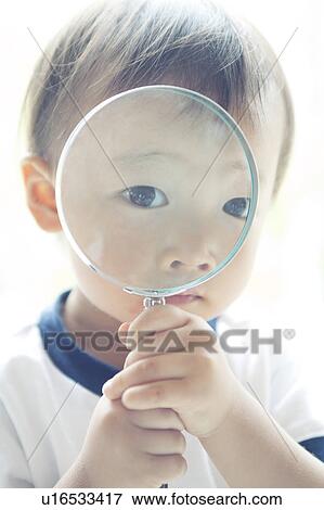 Baby Boy Looking Through Magnifying Glass View Large Photo Image Stock Photo - Baby Boy Looking Through Magnifying Glass. Fotosearch