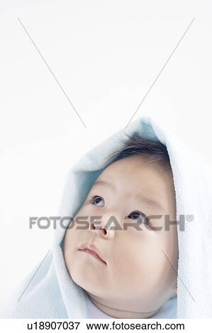Stock Photo - Baby Boy Looking Up. Fotosearch