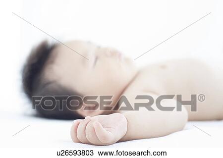 Stock Image - Baby Boy Sleeping. Fotosearch