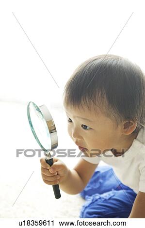 Baby Boy with Magnifying Glass View Large Photo Image Stock Image - Baby Boy with Magnifying Glass. Fotosearch