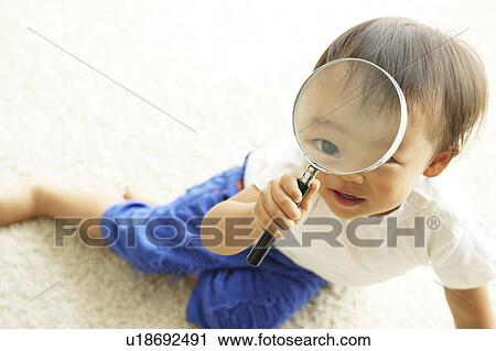 Baby Boy with Magnifying Glass View Large Photo Image Stock Image - Baby Boy with Magnifying Glass. Fotosearch
