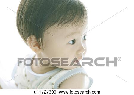 Baby looking away View Large Photo Image Stock Photo - Baby looking away. Fotosearch