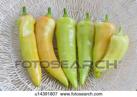 Banana peppers in a basket View Large Photo Image Stock Photo - Banana peppers in a basket. Fotosearch