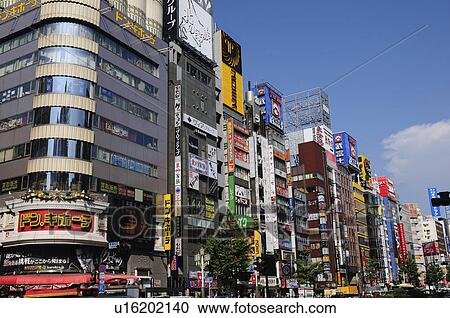 Stock Image - Buildings and Advertising Signs in Kabuki-cho. Fotosearch