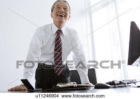 Businessman at Desk View Large Photo Image Picture - Businessman at Desk. Fotosearch
