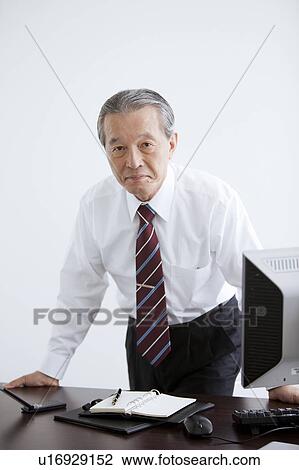 Businessman at Desk View Large Photo Image Stock Image - Businessman at Desk. Fotosearch